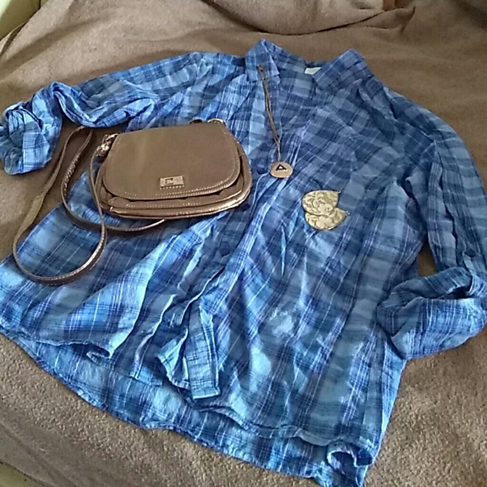 Cute Maurices bottom down trendy plaid shirt.